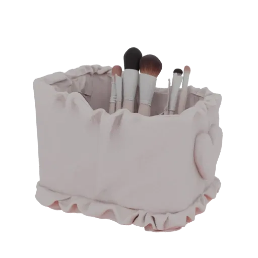 3D-модель розового держателя для кистей для макияжа с рюшами и сердцем сбоку, наполненная кистями для макияжа.