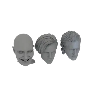 3D-рендер, показывающий три разные головы персонажей: одну лысую с широкой улыбкой, одну с волнистыми волосами и одну с текст