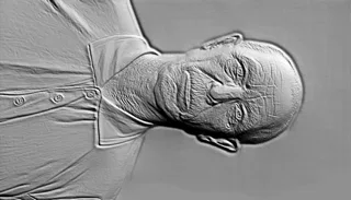 3D модель барельефа пожилого мужчины в рубашке, выполненная в скульптурном стиле.