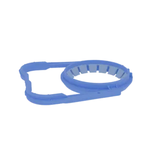 3D model of a blue intake manifold gasket with a distinctive ribbed inner edge, presented on a white background.