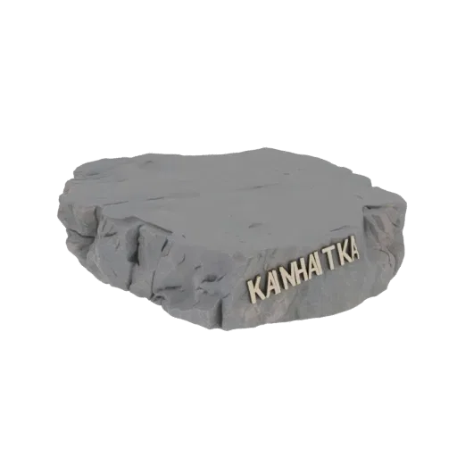3D модель серой текстурированной скальной основы со словом 'KAMCHATKA', написанным металлическими буквами.