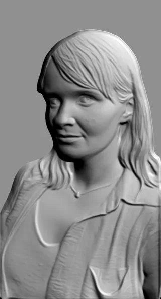 3D модель барельефа женского лица с развевающимися волосами, выполненная в сером цвете на сером фоне.
