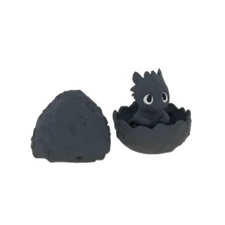 3D модель милого детеныша Ночной Фурии с большими глазами, вылезающего из треснувшей скорлупы яйца, с отдельным куском скорлу