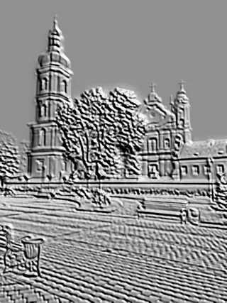 3D модель барельефа, изображающая старинную церковь с высокой колокольней, деревьями и мостовой.