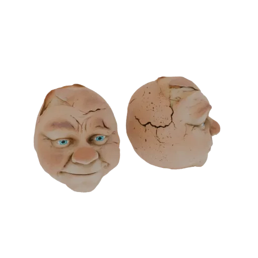3D-модель треснувшего яйца с человеческим лицом, показанная с двух ракурсов на белом фоне.